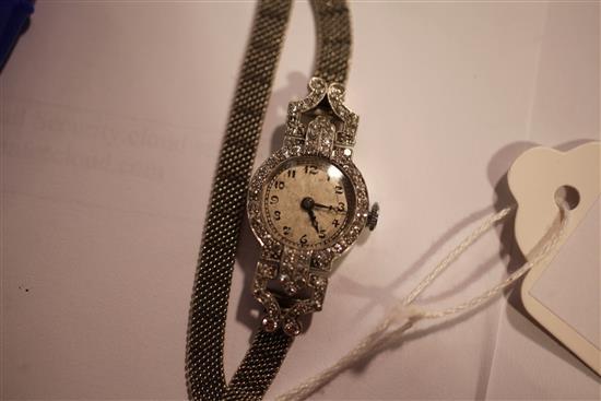 A ladys 1930s/1940s platinum and diamond cocktail watch,